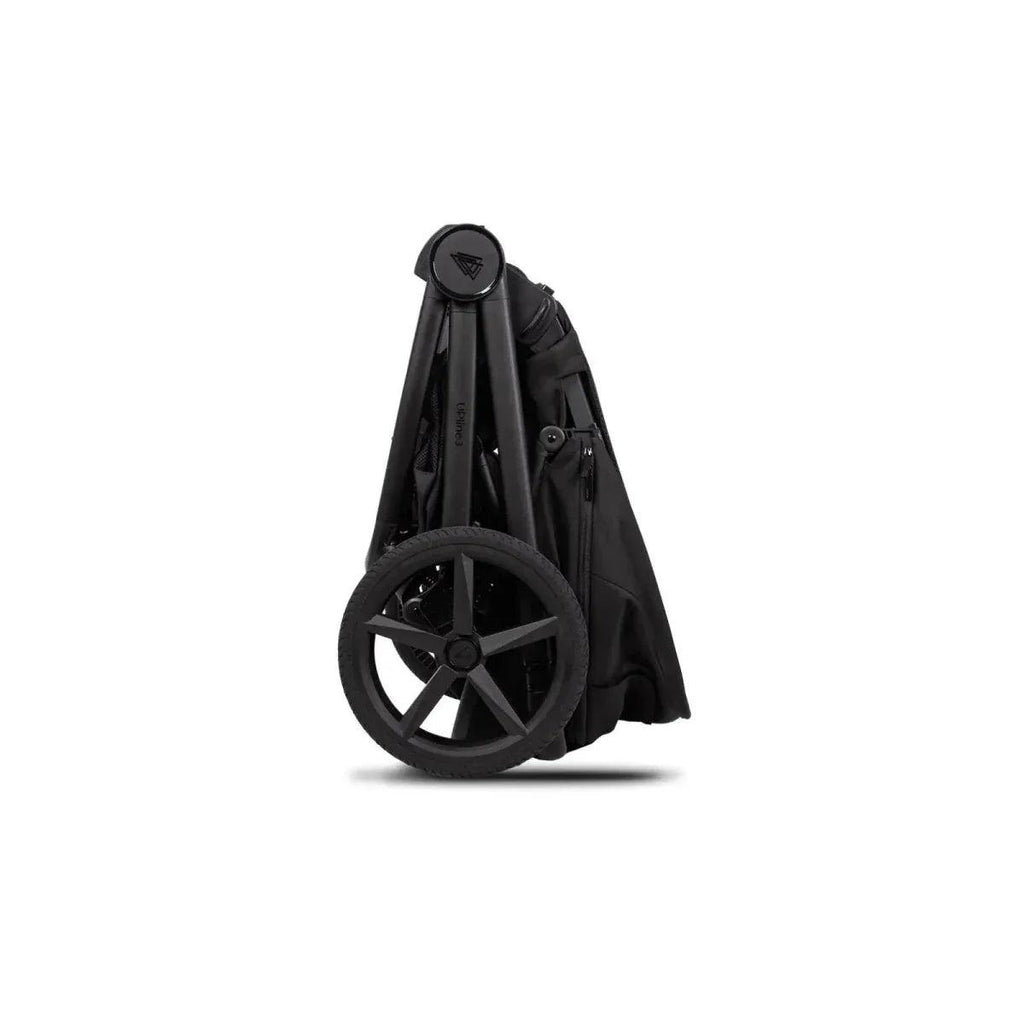 Folded black stroller bundle with large wheels and attached fabric cover