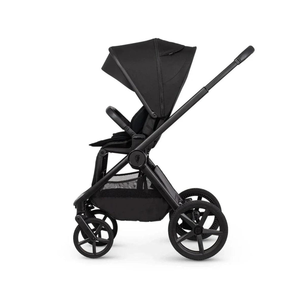 Black stroller with canopy and front accessory tray, side view with large wheel hubs