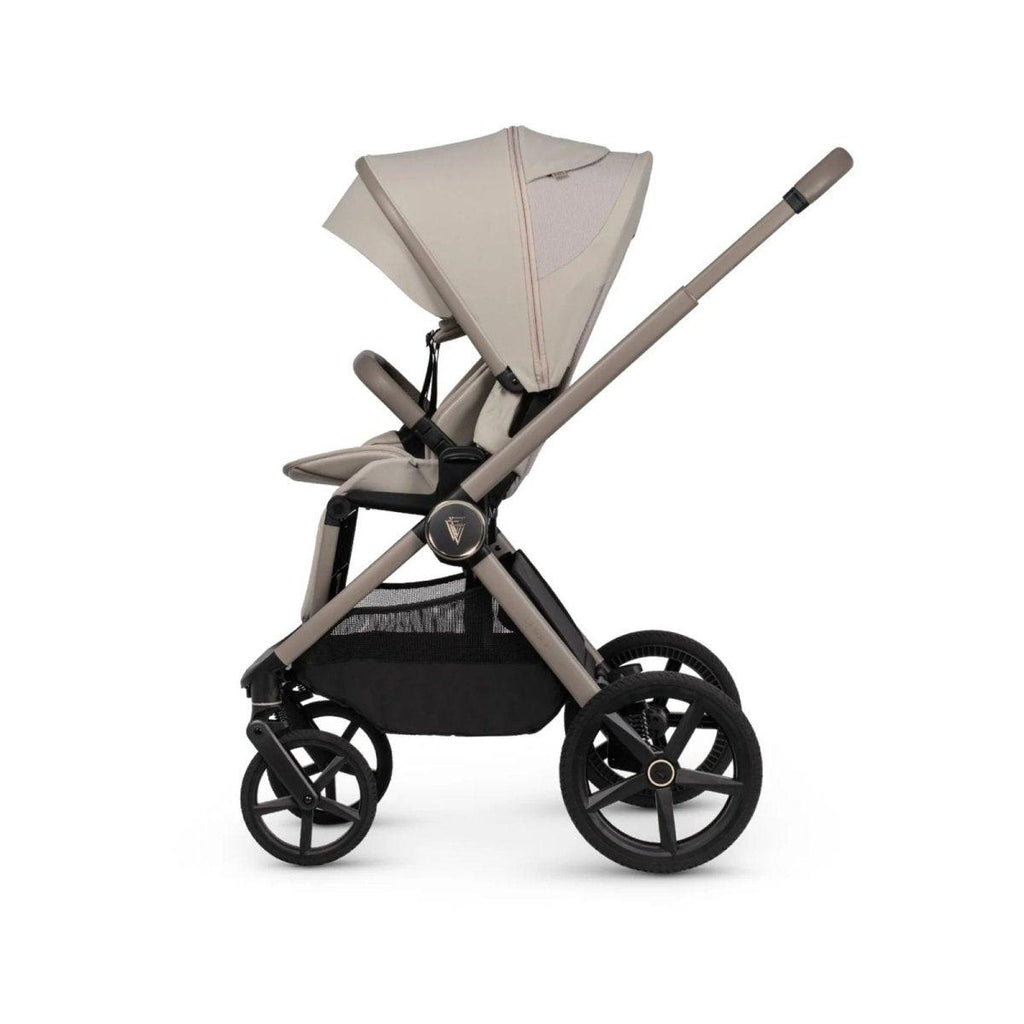Beige stroller seat unit with canopy, dark basket panel, and light frame