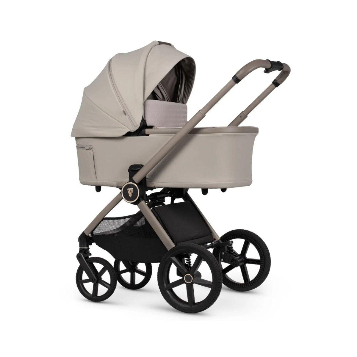 Beige carrycot stroller with hooded canopy, padded liner, and black wheels