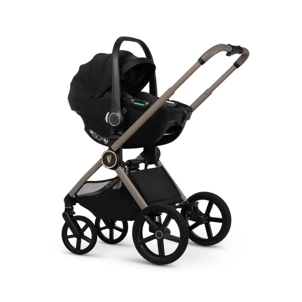 Black stroller with newborn carrycot and light frame, shown with canopy