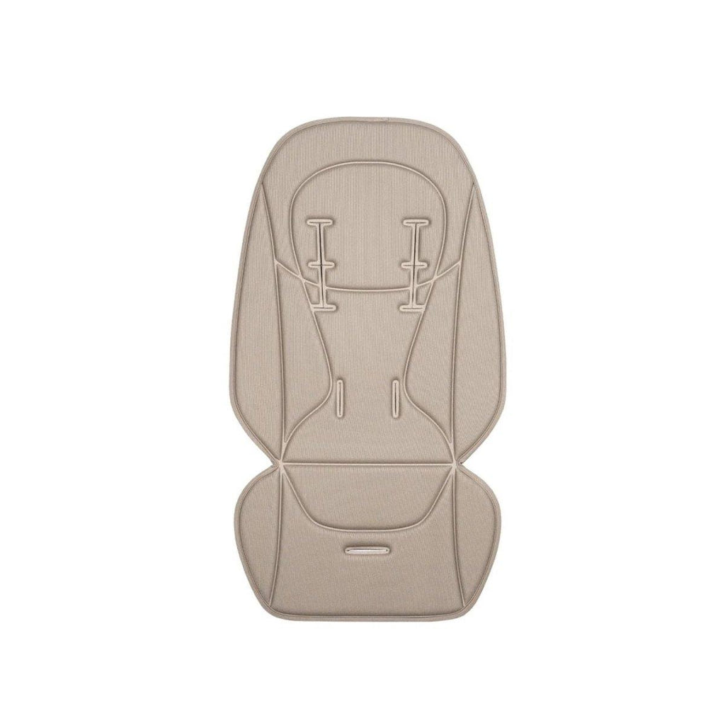 Beige stroller seat liner with harness openings and padded foot section