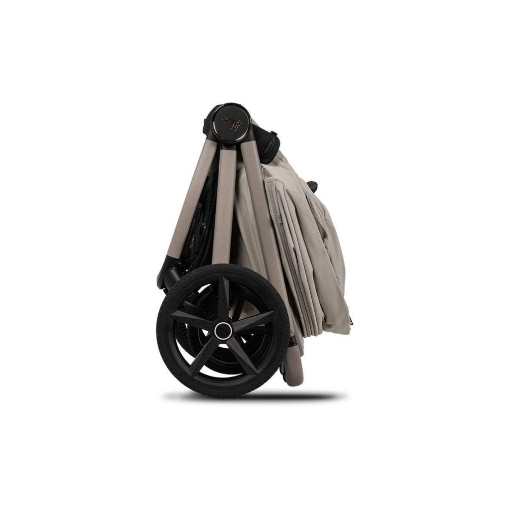 Grey stroller accessory bundle with large black wheel and folded frame