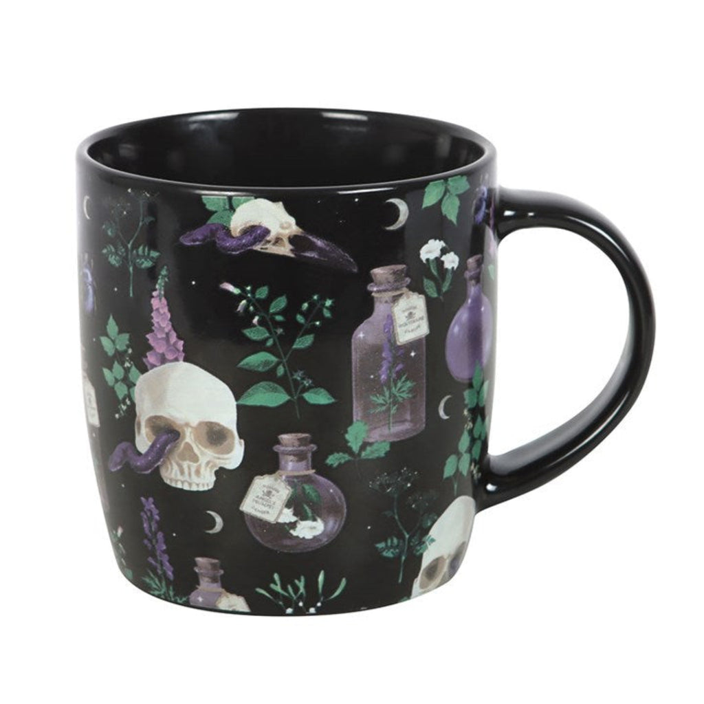 Black mug with skull and potion design on a white background