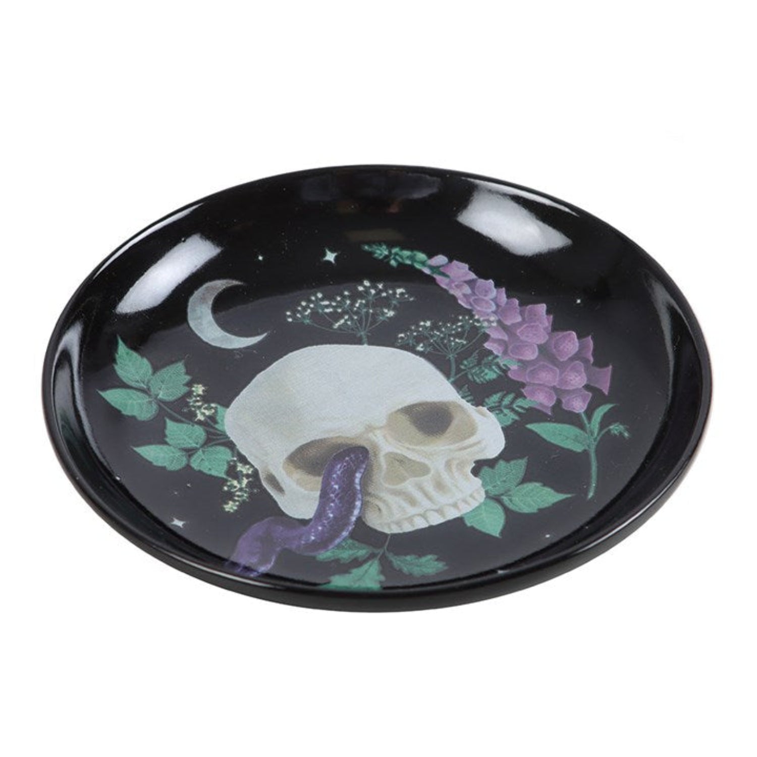 Black decorative plate with a skull and floral design on a white background