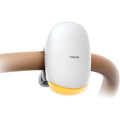 White VTech sound and motion unit with yellow base, mounted on stroller handle