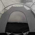 Interior tent entrance with mesh window and dark grey floor paneling
