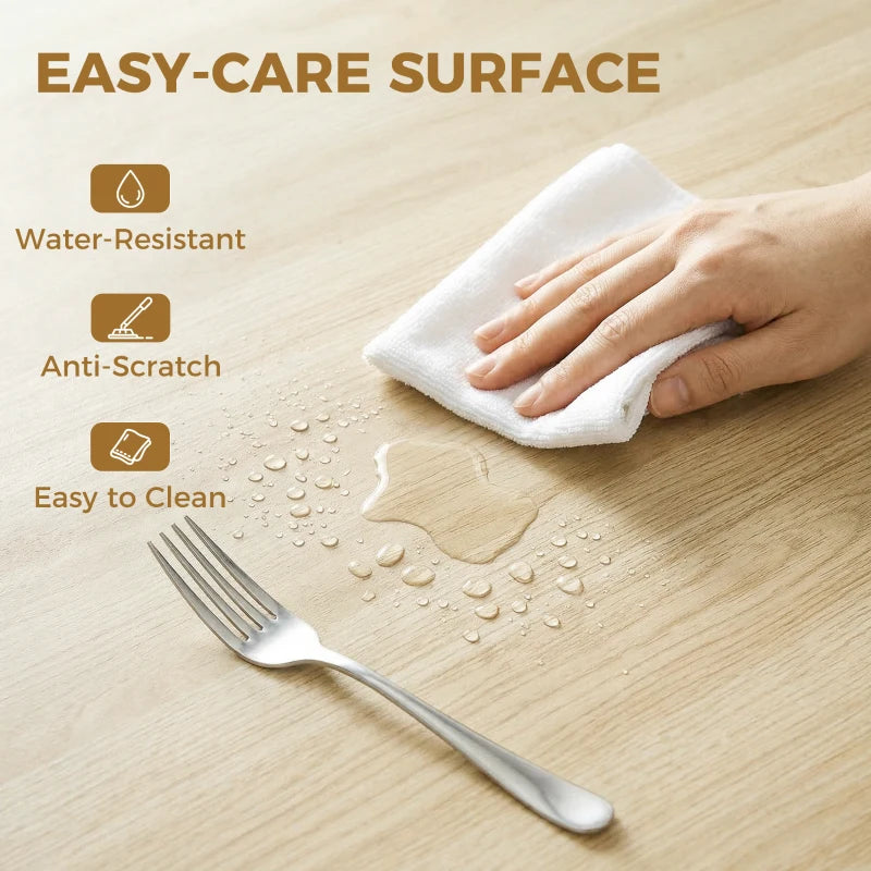 Natural wood table surface with water droplets, wiped clean with cloth