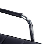 Black armrest with chrome support tube on a rolling office chair