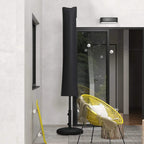 Black umbrella cover standing next to entrance on patio with umbrella base