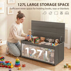 Dark grey wood-effect storage box with open lid, filled with toys and stuffed animals