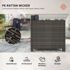 Wicker rattan armchair with mixed brown woven finish and navy cushion, corner close-up.