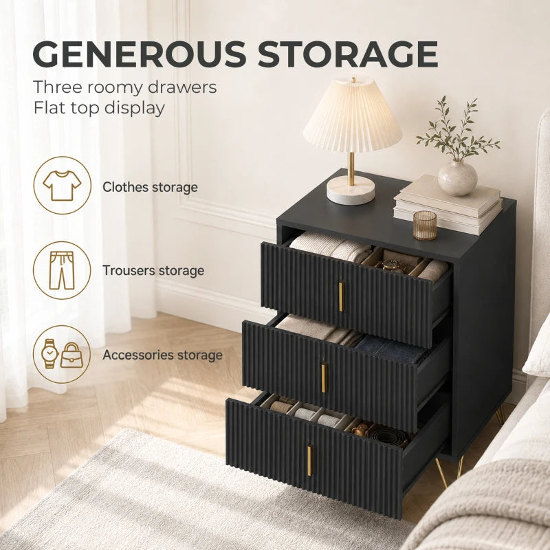 Black dresser with fluted drawer fronts, three open drawers, and gold bar handles.