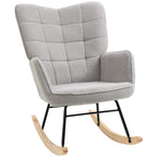 Light grey upholstered nursery glider rocker chair with tufted back and fabric seat