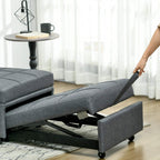 Grey convertible chair bed extended to sleeper position with pillow and rolling wheels