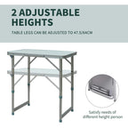 Silver foldable picnic table with two-tier frame and adjustable-height legs