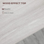 White wood-effect tabletop close-up with light grain texture and beveled edge