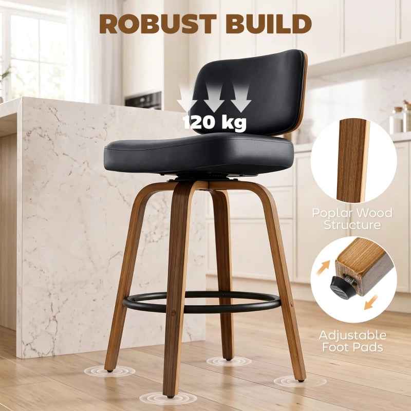 Black bar stool with padded seat, curved back, light wooden frame, round footrest