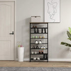 Black freestanding shoe rack with mesh shelves, holds multiple pairs