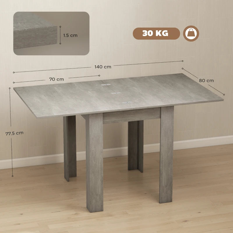 Grey extendable dining table with rectangular tabletop and four vertical support legs.