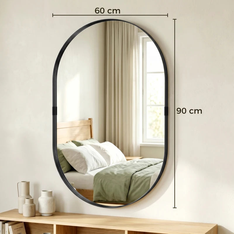 Black oval wall mirror with thin rounded frame and reflective glass