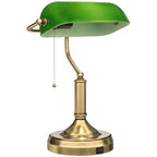 Green glass desk lamp with bronze base and pull-cord switch on slender stem