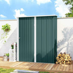 Green corrugated steel garden shed with front door closed on outdoor deck
