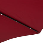 Red umbrella canopy edge with LED clips along the seam