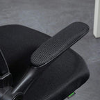 Black padded armrest and textured upholstery detail on office chair