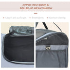 Grey pet carrier with zipped mesh door and rolled-up mesh window for airflow