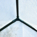 Walk-in greenhouse corner with dark frame tubes and mesh polytunnel cover