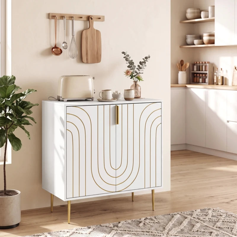 White cupboard with curved gold line pattern, gold handles, and tapered metal legs