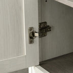 Antique white cabinet door with metal hinge and latch hardware on lower panel