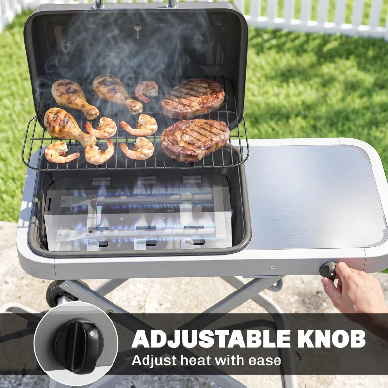 Open black gas BBQ grill lid with lit cooking food and adjustable burners