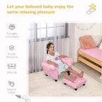Pink cloud-pattern toddler armchair with pull-out ottoman, wide arms and dark legs