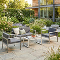 Outdoor 4-piece garden seating set with dark grey cushions, aluminium frames, and coffee table