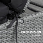 Black cushion tie strap secured to wicker chair frame with metal fastener