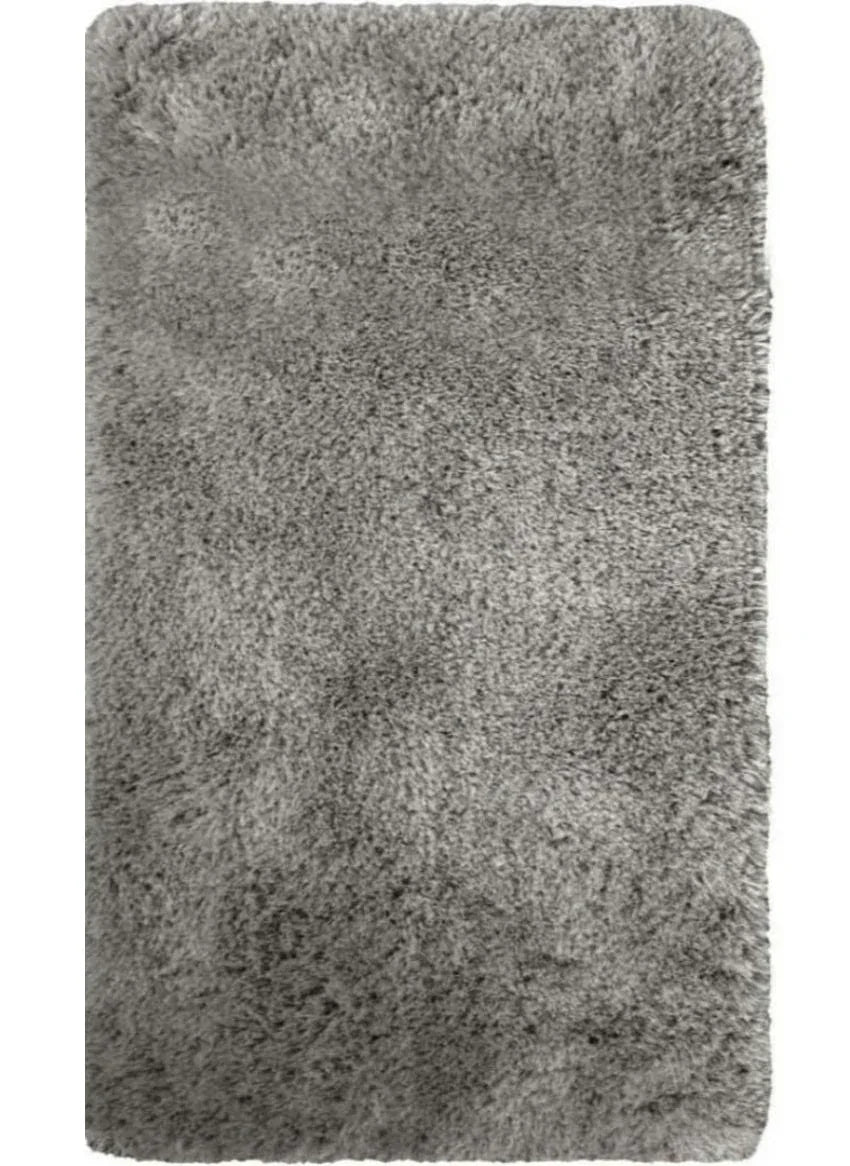 Grey shaggy rug with soft pile, rectangular design.