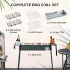 Green portable charcoal BBQ grill complete set with charcoal grate and seasoning baskets