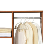 Walnut hanging rail with white and light-colored shirts on hooks