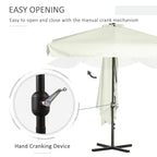 Off-white half umbrella with manual crank mechanism on the black metal pole