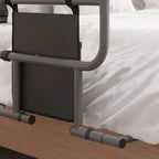 Black storage pocket panel on a bed assist rail with base foot bars and end caps.