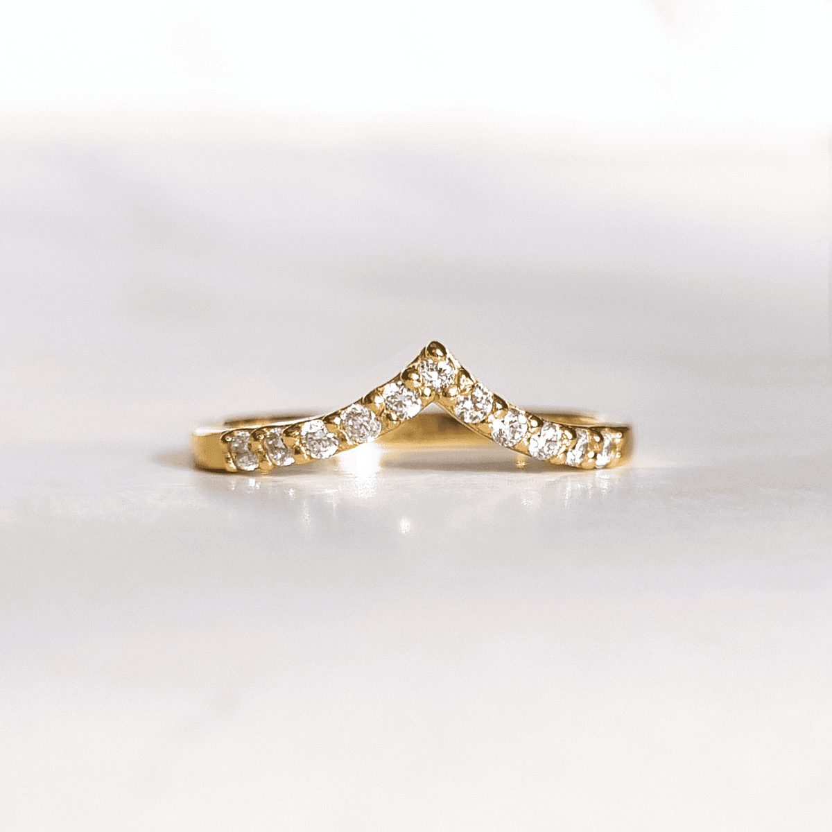 Curved wishbone eternity ring in gold vermeil with pavé-set stones