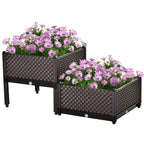 Pair of brown raised plastic garden planters with textured sides and blooming flowers