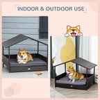 Grey elevated dog bed with canopy roof and cushioned platform, indoor/outdoor use