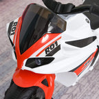 Close-up of a white and red 3-wheel ride-on police bike with front headlight lens