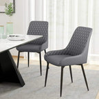 Grey PU leather accent dining chairs with diamond quilting and tapered black metal legs