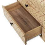 Open drawer of natural 6-drawer dresser with zigzag front and black handle, empty interior.