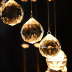 Warm glowing crystal bead chandelier pendant with faceted glass drops