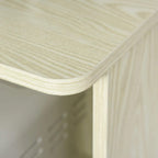 Curved light oak tone shelf edge underside on a storage cabinet unit
